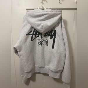 Stussy Grey Crewneck Sweatshirt with Black Logo Tag